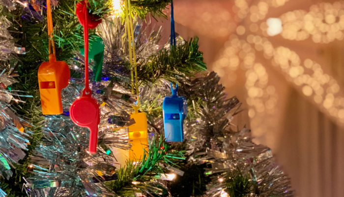 Colourful whistles in a christmas tree