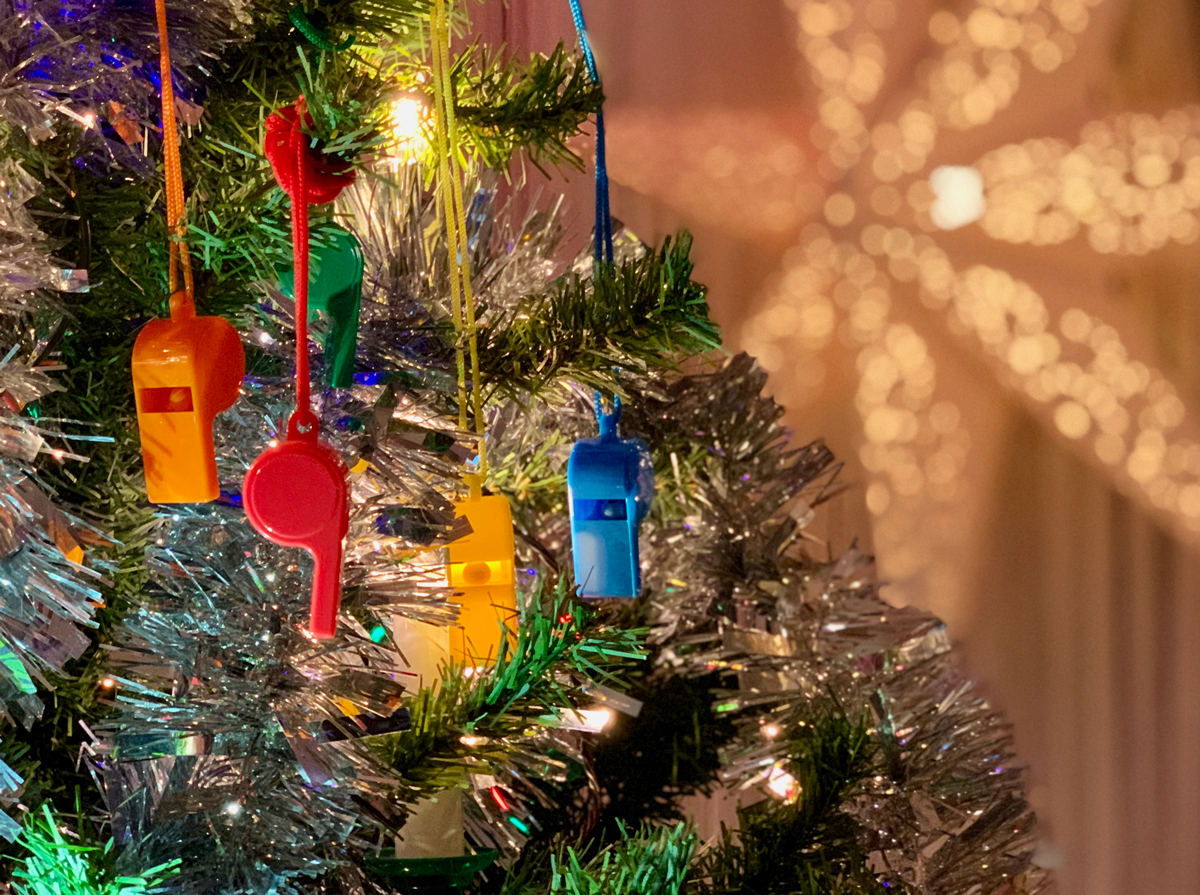 Colourful whistles in a christmas tree