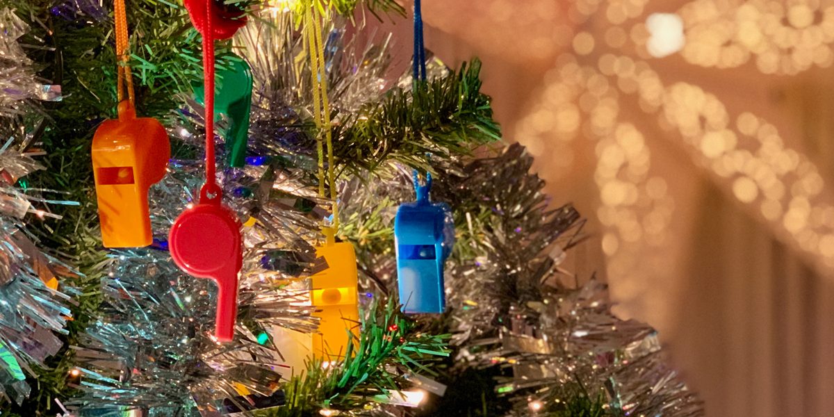 Colourful whistles in a christmas tree