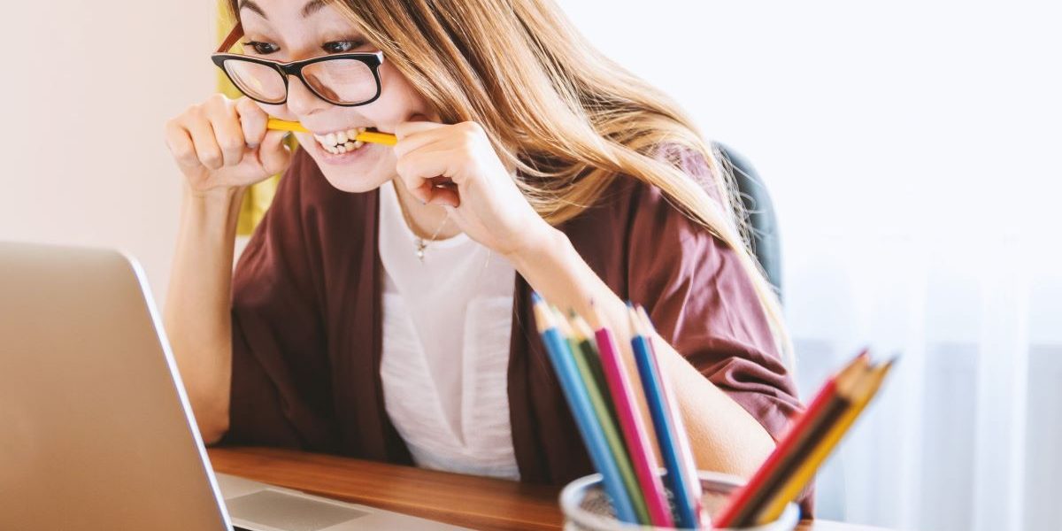 woman witing pencil